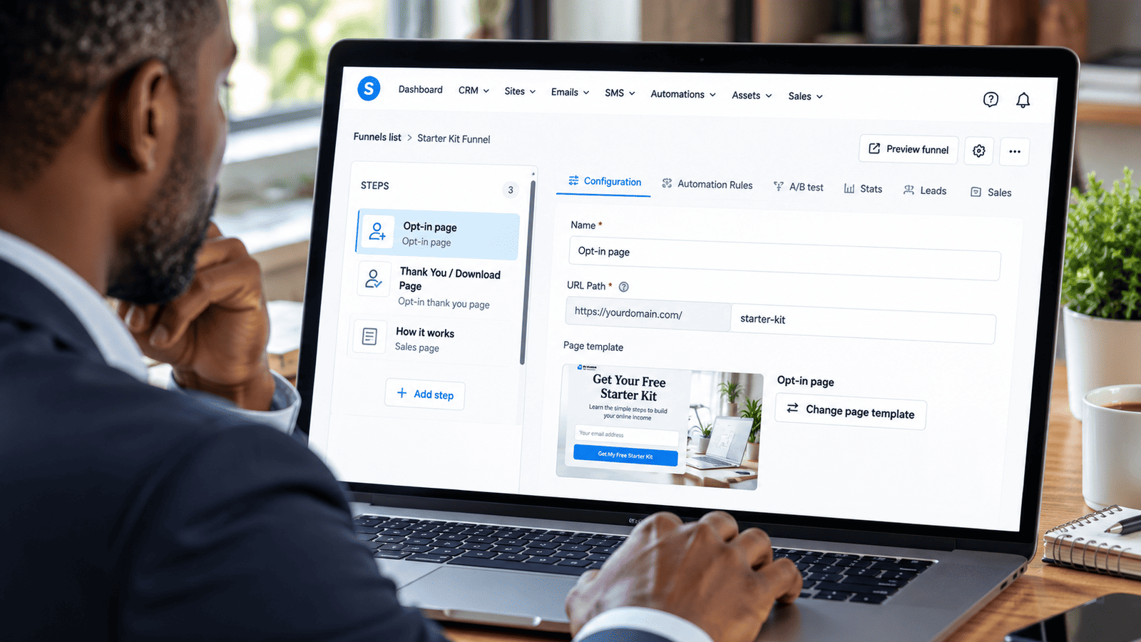 Business owner working on a sales funnel dashboard with opt-in, thank-you and sales pages